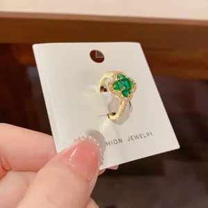 Gold four-leaf clover green zirconia open ring fashion statement luxury jewelry design