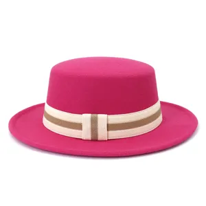 Wool felt flat-top fedora hat detail, elegant pink winter hat with striped elastic band.