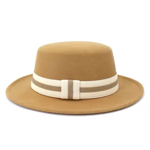 Detail view of autumn winter wool flat top fedora hat with elegant striped band decoration.