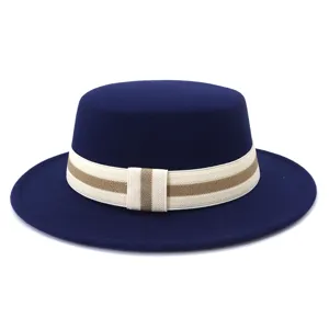 Blue wool felt flat top fedora hat detail view with stylish striped ribbon band.