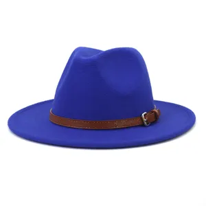 Detailed close-up of a royal blue wool fedora hat featuring a brown leather strap and metal buckle.