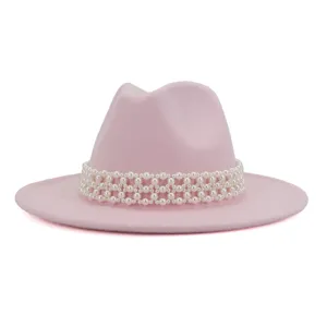 Pink wool fedora hat for women, elegant wide brim jazz cap adorned with delicate pearl band.