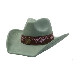 Green suede cowboy hat with embroidered bull skull and metal studs western fedora detail