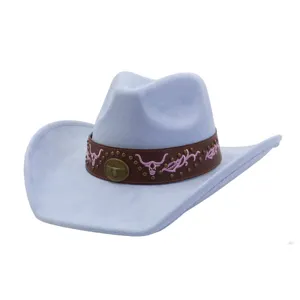 Close-up of light blue suede cowboy hat, brown leather band with pink embroidery and studs.