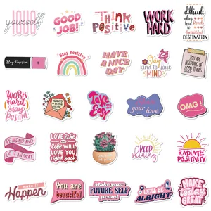 Detailed view of pink motivational phrase stickers, perfect for journal and laptop decoration.