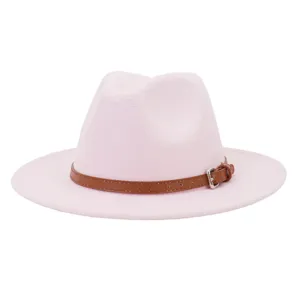Close-up of pink woolen fedora hat featuring a stylish brown leather belt and metal buckle detail.
