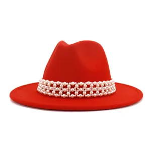 Red wool fedora hat for women with elegant pearl band detail showcase, classic wide brim winter hat.