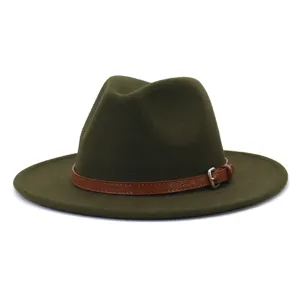 Detail shot of army green wool fedora hat with brown leather belt and metal buckle.