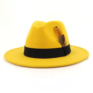 Detailed view of yellow wool fedora hat showing black ribbon and feather decoration.