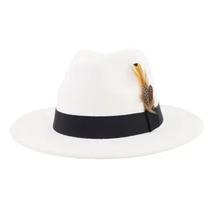 Detail view of the elegant white wool fedora hat, featuring a black band and chic feather accent.