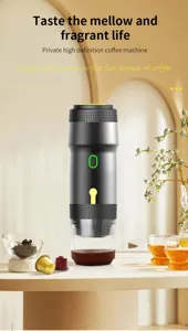 Portable capsule coffee machine detail view, compact espresso maker for travel and home use.