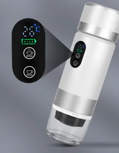 Portable coffee maker detail view showing LED temperature display screen and USB port.