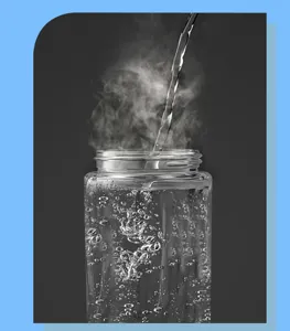 Clear portable juicer cup body detail view showing hot water pouring and steam effects.