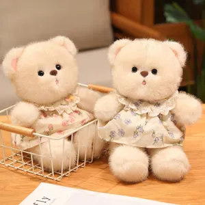 Niedlicher Plüschbär mit Blumenkleid, weiches Kuscheltier für Kindergeschenke und Dekoration.