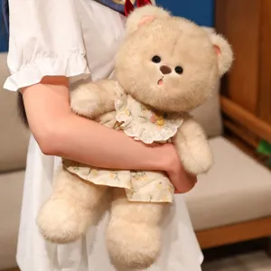 Flauschiger Teddybär Plüschtier mit süßem Blumenkleid,weiches Kuschelkissen für Kinder.