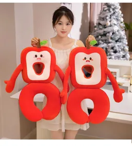 Cute red apple plush U-shaped nap pillow detail view, perfect for office and travel use.