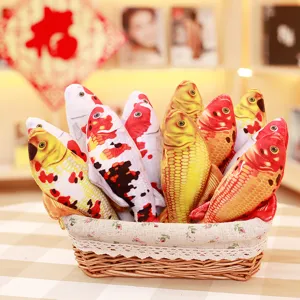 Close-up of cute simulation koi fish plush toys arranged neatly in a woven basket for display.