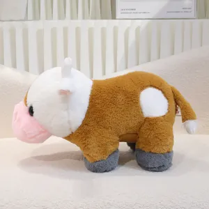 Simpatico peluche di mucca morbido con pelo marrone e bianco, compagno ideale per bimbi.