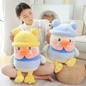 Cute plush duck toy with hat soft stuffed animal pillow for kids girls bed hugging doll