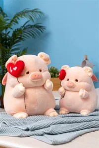 Cute pink plush pig stuffed animal toy with heart balloon for birthday gift, soft doll.