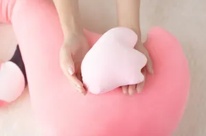 Flamingo plush toy detail view showing soft down cotton filling and cute pink texture.