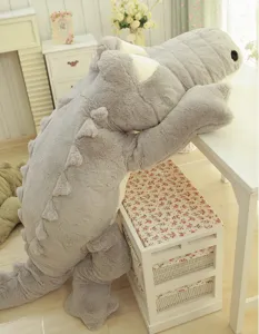 Large gray crocodile plush toy pillow detail view, soft cute stuffed animal cushion.