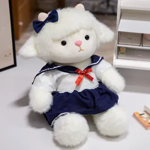 Cute white sheep plush toy detail showing soft furry texture and sailor uniform dress.