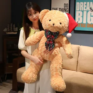 Christmas teddy bear plush toy with Santa hat and festive bow for holiday decoration gift