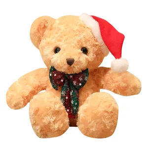 Christmas teddy bear plush toy cute stuffed animal with holiday hat and festive bow tie.