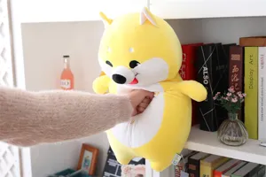 Detailed close-up view of the soft yellow dog plush toy, highlighting elastic softness.