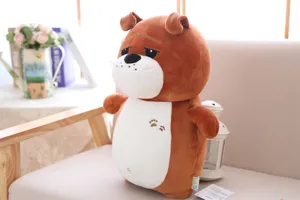 Detail of cute brown plush dog toy with soft filling, sweet face, and paw detail.