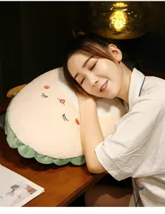 Cute plush throw pillow detail shot, soft stuffed animal cushion for bedroom or sofa relaxation.