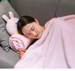 Cute pink flannel roll blanket with cartoon rabbit pillow, perfect for office, travel, and kids use.