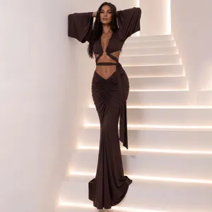 Elegant dark brown two-piece cutout flare sleeve top and ruched maxi skirt set for summer.