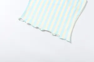 Close-up detail of the stylish blue and white striped women summer vest with lettuce hem.