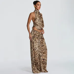 Exquisite leopard print detail showing the stylish halter top and wide-leg trousers set.