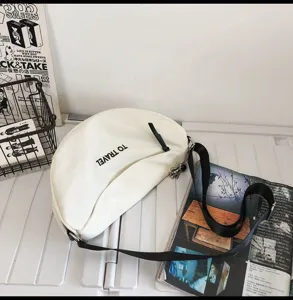 Bolso bandolera de lona casual para uso diario, bolso cruzado espacioso con estampado elegante.