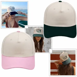 Custom five-panel trucker hat featuring contrast brim and stylish embroidered text details.