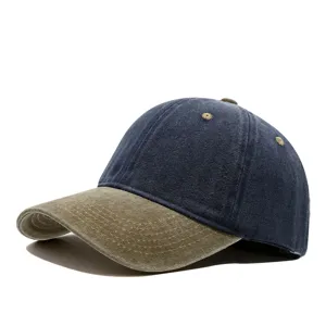 Detailed view of the washed denim baseball cap showcasing vintage contrast brim and stitching.
