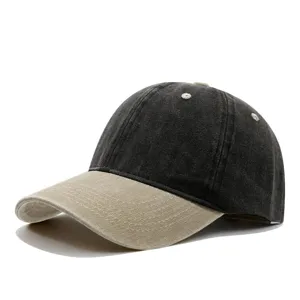 Closeup of vintage washed denim baseball cap detail, two-tone design, curved brim.