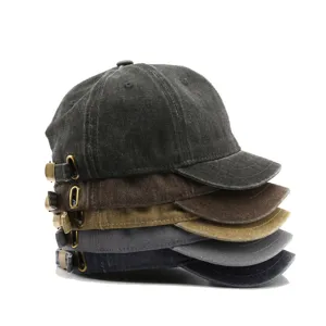 Retro washed short brim baseball cap detail, vintage soft top dad hat with metal buckle.