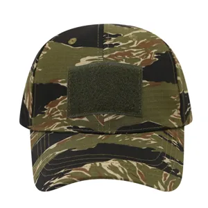 Close up view of tactical baseball cap featuring tiger stripe camo pattern and front loop patch.