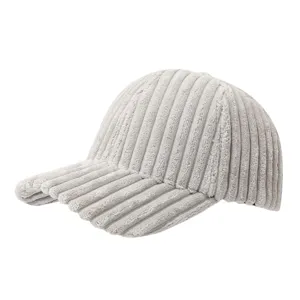 Detailed view of the thick corduroy baseball cap, textured fabric, soft and warm fit.