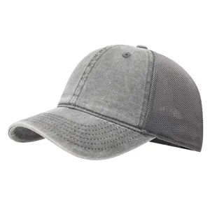 Close-up detail of grey washed cotton mesh baseball cap with breathable fabric and vintage style.
