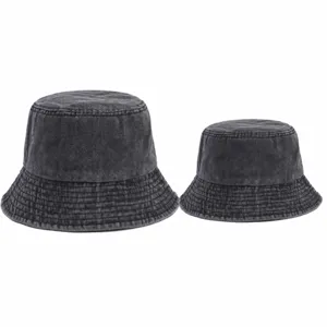 Detailed size comparison view of parent-child washed denim bucket hats in dark gray.