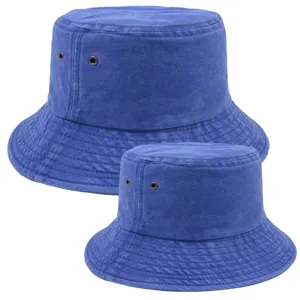 Close-up detail of blue washed cotton bucket hat, showing metal eyelets and fine stitching.