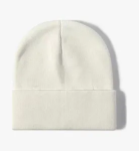 Plain knit beanie hat detail view, soft acrylic fabric, roll cuff winter warm wool cap.