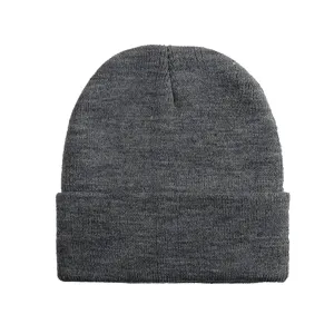 Dark grey knitted beanie close-up, plain roll-up winter warm wool hat detail display.