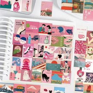 Detail shot of Japanese retro aesthetic pink stickers displayed on notebook for diy crafts.