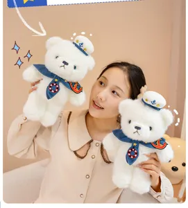 Small sailor teddy bear plush toy detail view, cute white stuffed doll for kids sleep companion.